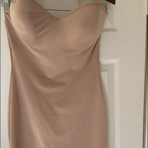 Strapless “bra-slip for smoothing those little budges!